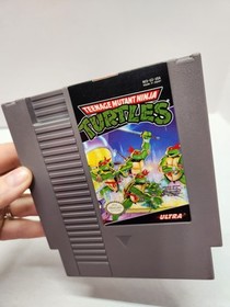 Teenage Mutant Ninja Turtles (Nintendo NES, 1989) con manuale