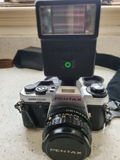 Pentax Super Program 35mm SLR Film Camera, with 3 lenses,flashlight,case, tested
