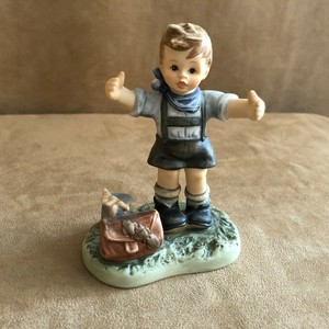 boy fishing figurine
