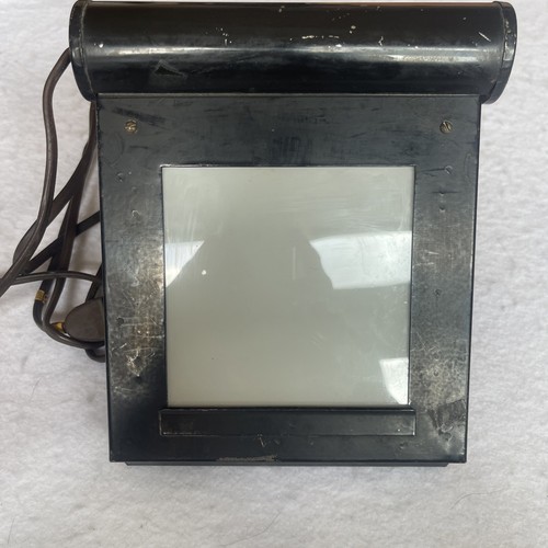 Caja de luz vintage para ver negativos plegable trabajando con bombilla fotos