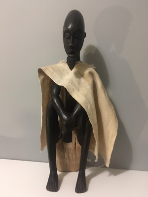 Sitzender Mann geschnitzt afrikanisch asiatisch weise