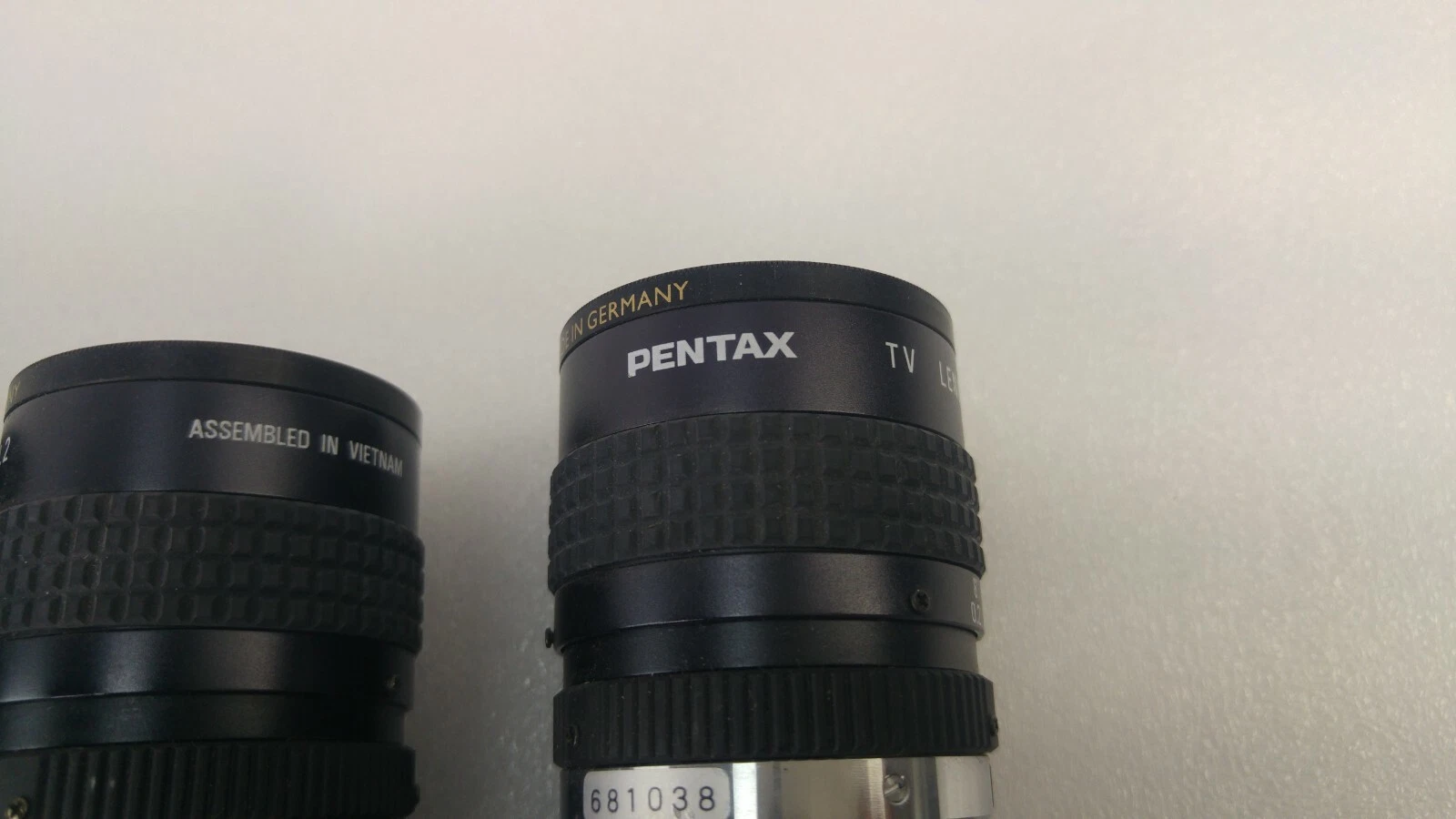Close-up of PENTAX TV LENS marking on one of the camera lenses
