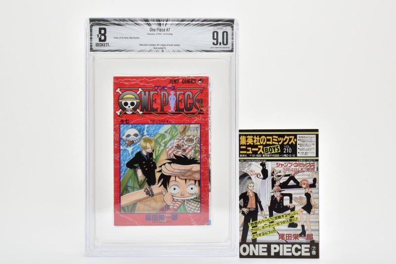 ALTERED BGS 9.0 - One Piece Volume 7 - 1st Print Includes comic news.