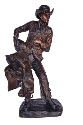 Cowboy Holding His Saddle Bronze Statue - Size: 20''L x 14''W x 35''H.