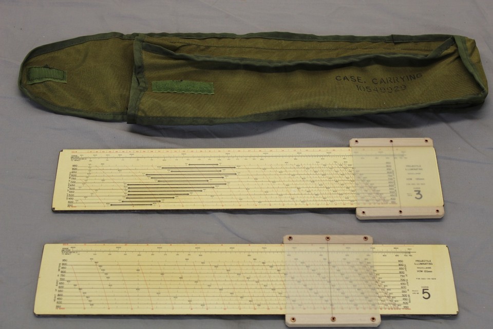 A Vietnam War-era military artillery slide rule used to calculate Howitzer firing solutions — this isn't a novelty, it's a genuine piece of Cold War ballistic history.