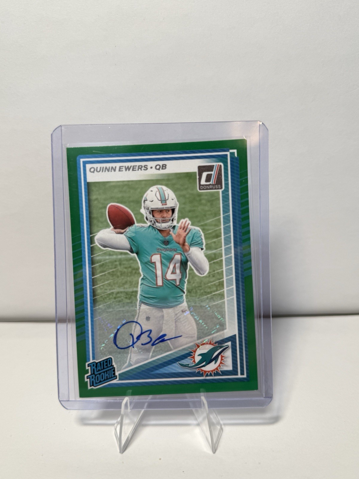 2025 Donruss Quinn Ewers Green Press Proof Rated Rookie Auto Dolphins #342