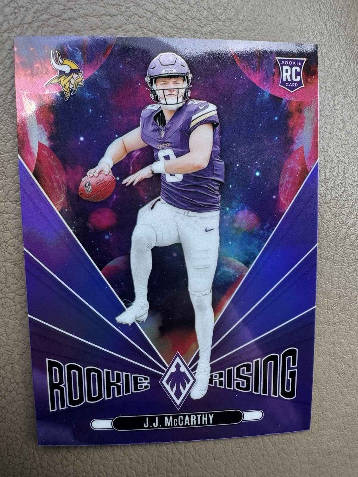 2024 Panini Phoenix - Rookie Rising J.J. McCarthy #RR-JMY Purple (RC)