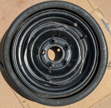 1970s Space Saver Spare B.f. Goodrich G78-14 Gm Rim With Pressure Relief Valve 1970s Space Saver Spare B.f. Goodrich G78-14 Gm Rim With Pressure Relief Valve