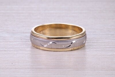 Ehering 6 mm breit zweifarbig drehbar gelb- und weißgold gemustert