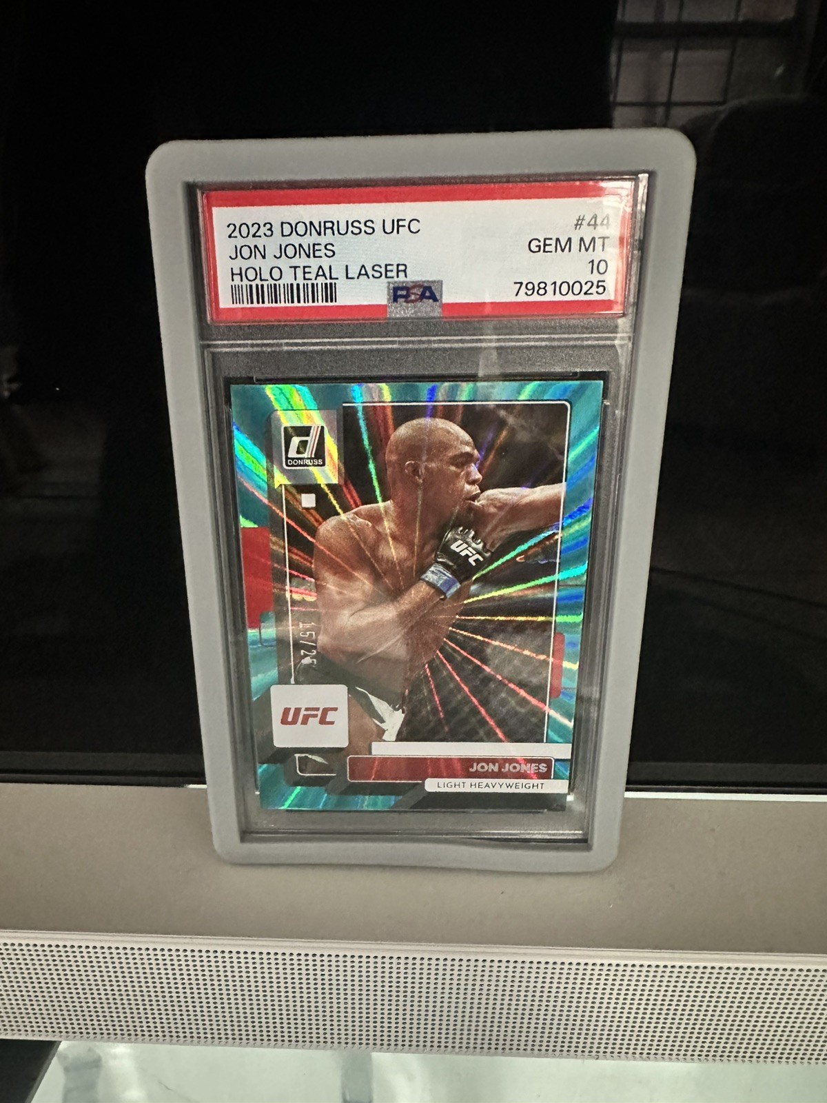 2023 Donruss UFC Jon Jones #44 Holo Teal Laser /25 view 1
