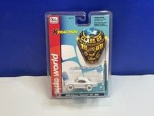 AUTO WORLD HO SCALE SLOT CAR CLASS OF 1969 CHEVY CAMARO SS 396 CHASE