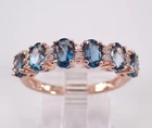 3Ct Oval Cut Lab-Created London Blue Topaz Engagement Ring 14K Rose Gold Plated