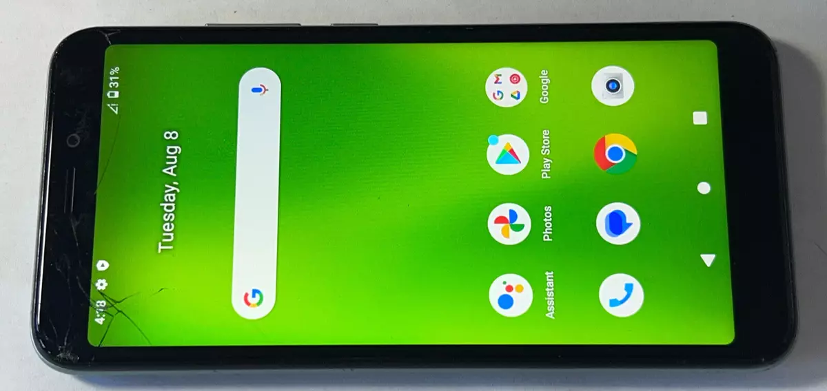 Cricket Debut Smart SL101AE 4G LTE Android Smart Cell Phone READ