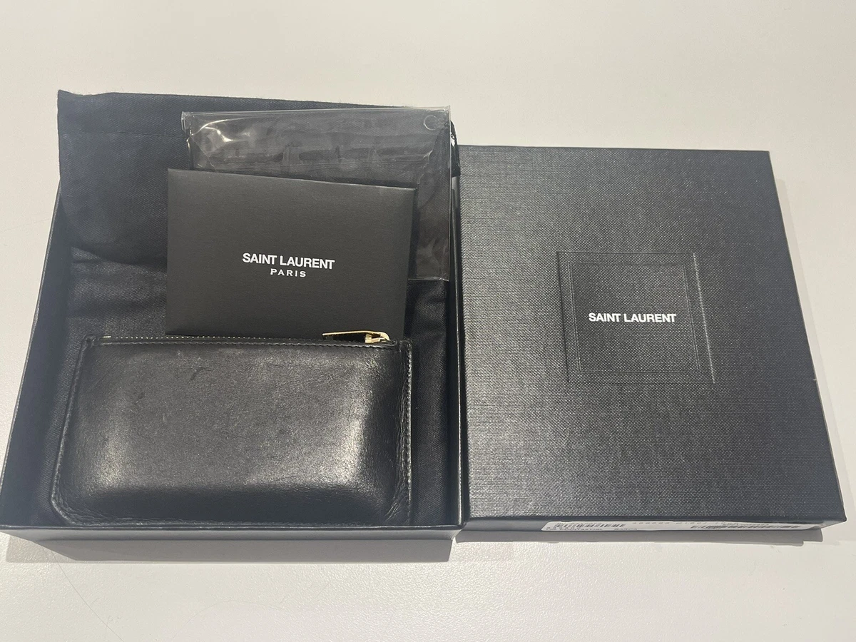 YSL Black leather card holder with zipper. Multiple fold