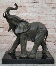 African Elephant Calf Bronze Sculpture with Raised Trunk on Marble Base
