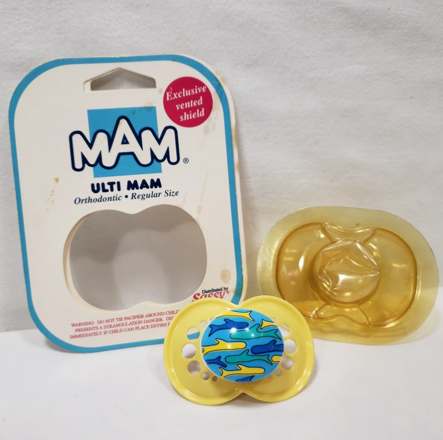 Vintage Ulti MAM Pacifier Blue Yellow Sharks 1995 Sassy Orthodontic Latex Nipple
Opens in a new wind