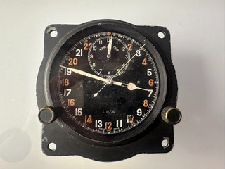 I THINK .. A S.Smith & Sons Mk III B World War II RAF aircraft cockpit clock