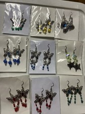 9 Pairs Of Butterfly Earrings Dangle Pierced Assorted Colors