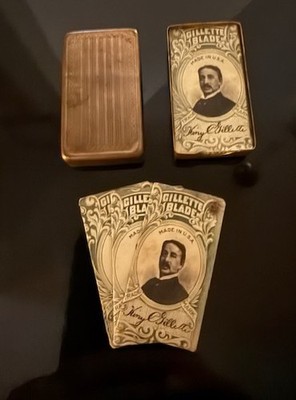 Antique brass Gillette blade bank, 10 wrapped  double-edge blade packs