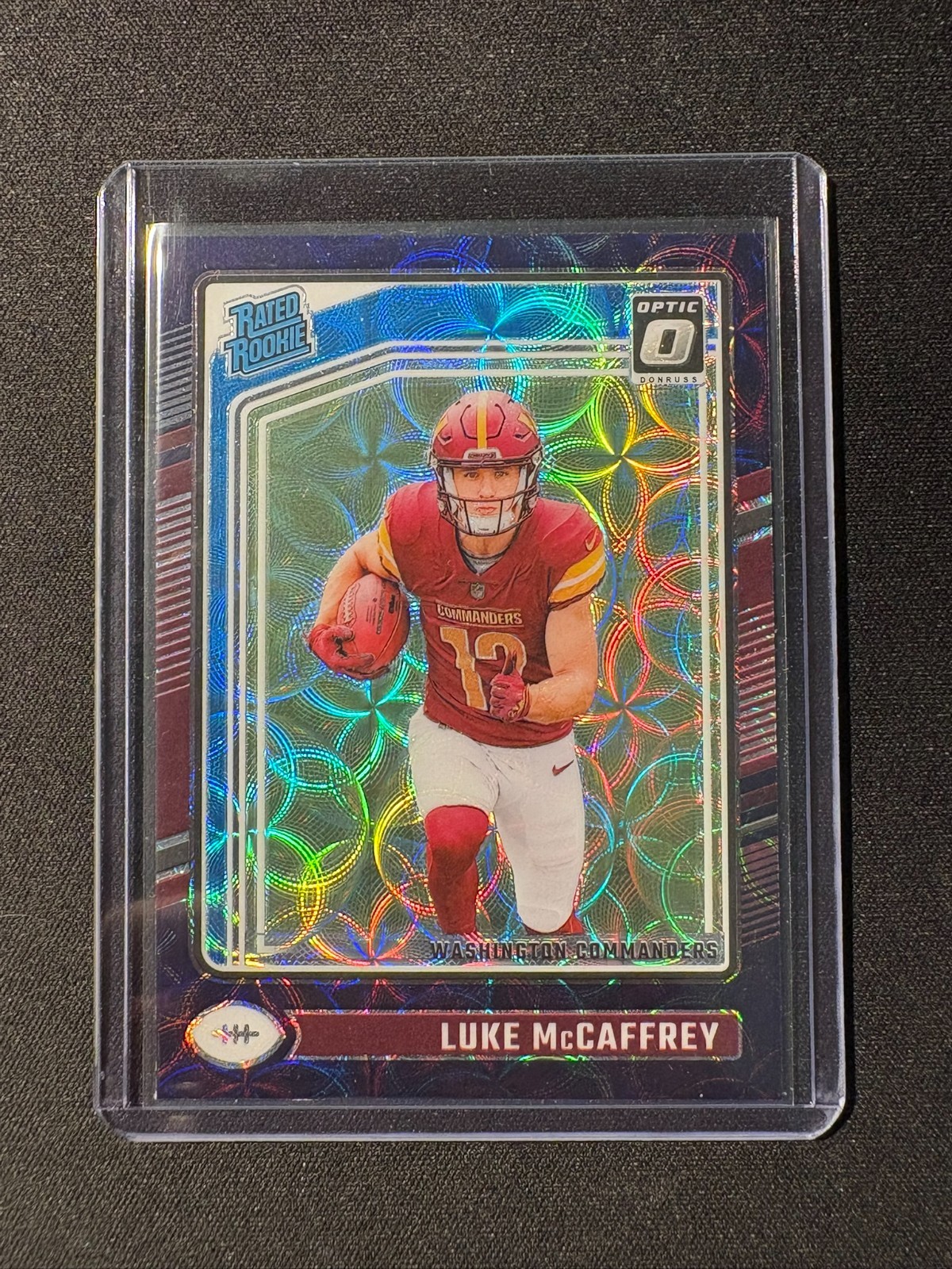 2024 Donruss Optic Luke McCaffrey Purple Scope Rated Rookie #268