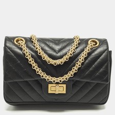 Chanel Reissue 2.55 Mini borsa nera con patta in pelle invecchiata Chevron