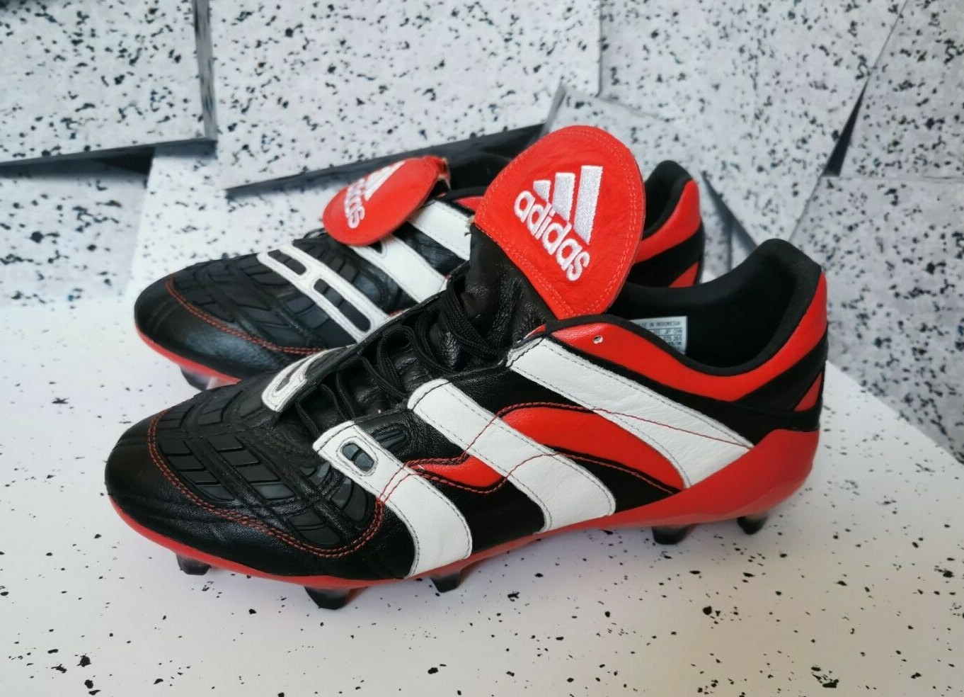 predator accelerator firm ground cleats