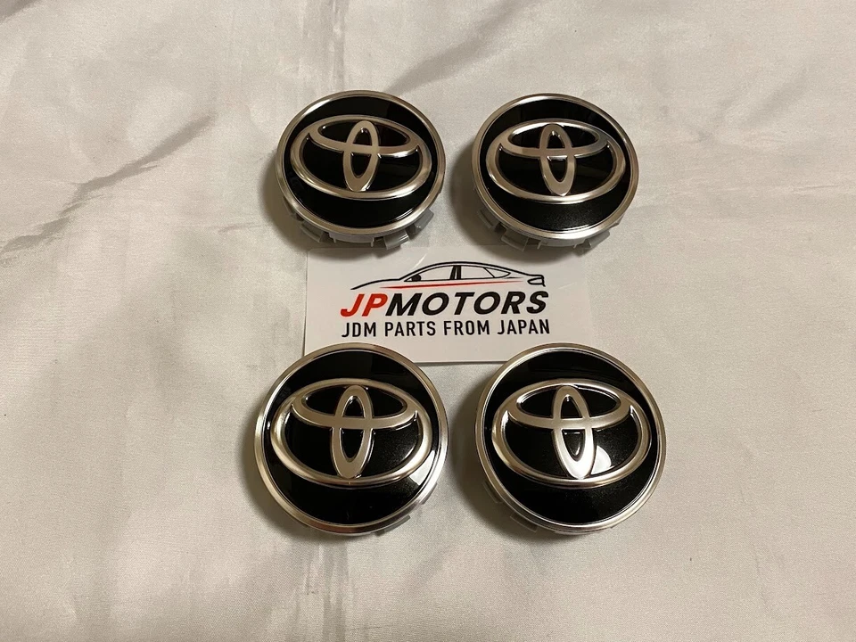 Juego de 4 tapas centrales de rueda genuinas TOYOTA negras/plateadas 60 mm 42603-42130 OEM Foto 2 de 4