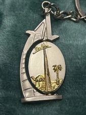 Double-Sided Rotating Dubai Burj Al Arab 3D Camel Scene Keychain Silver Tone