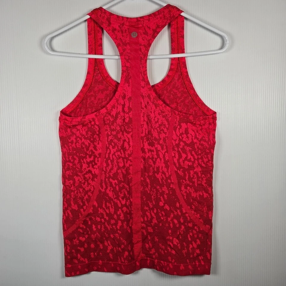 Camiseta sin mangas Lululemon Swiftly Tech espalda cruzada 2.0 camuflada roja roca/acampanada talla 6 nueva sin etiquetas Foto 2 de 4