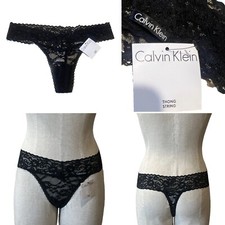 CALVIN KLEIN NWT 29.95 QP1309O BLACK LACE STRETCH STRING THONG M/12AUST/8US
