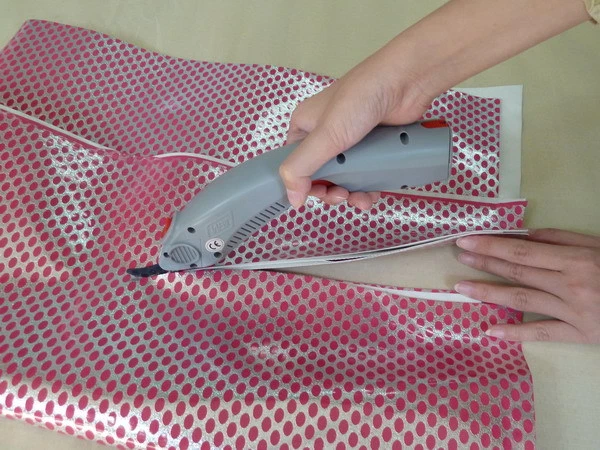 Tijeras de tela eléctricas de calidad Tijeras eléctricas de corte para bolsas de tela textil Foto 4 de 4