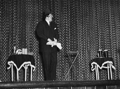 Comedy conjuror Tommy Cooper rehearses his act before the Ro - 1953 Old Photo 1
