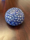 vintage Murano glass paperweight featuring a dense millefiori Pattern
