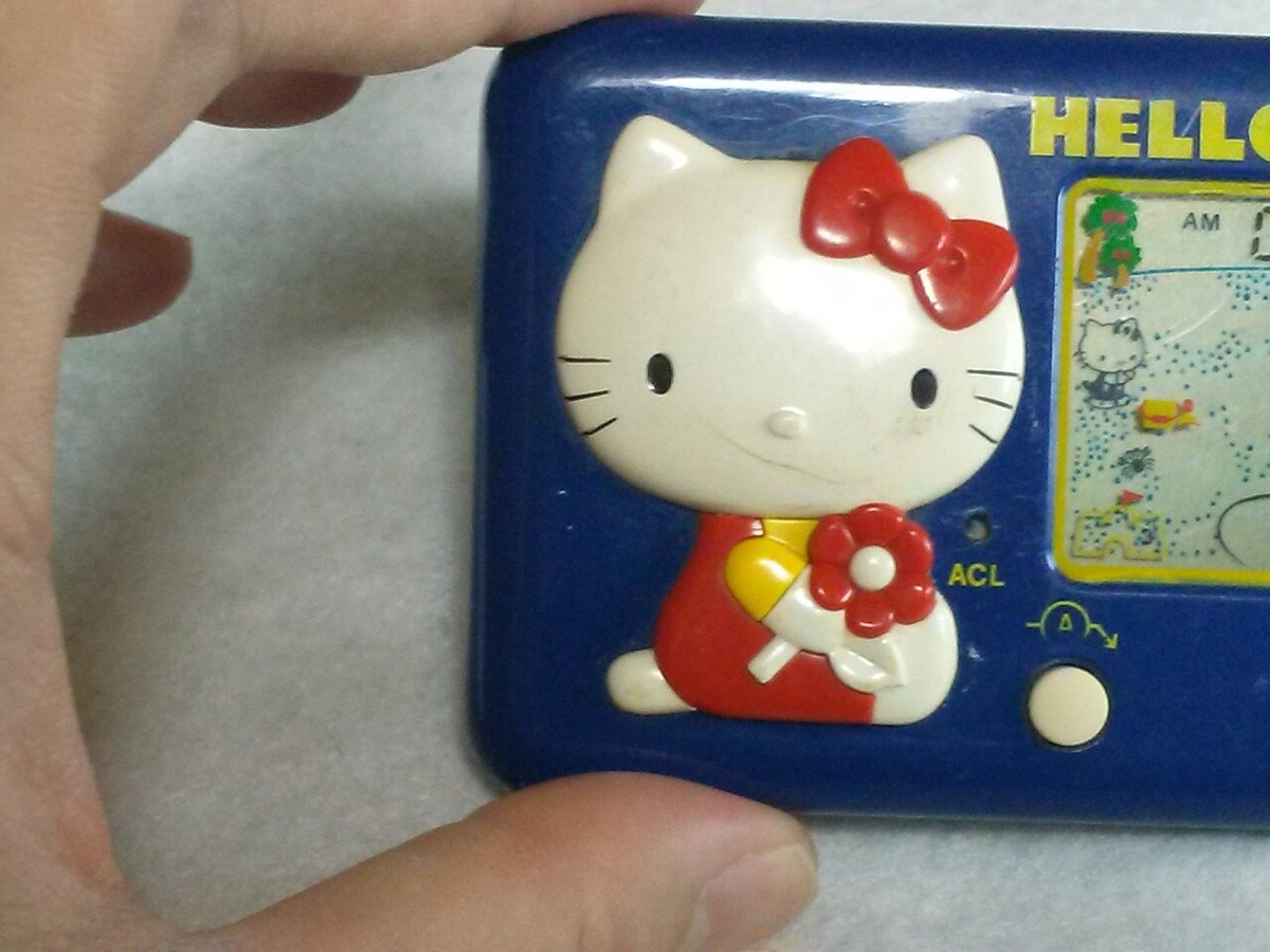 Hello Kitty Seaside Holiday / Tomy / VINTAGE Game watch