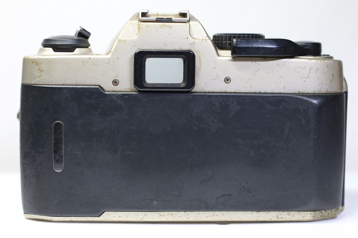 Nikon FM10 SLR 35mm Film Camera + Zoom Nikkor 35-70mm F/3.5-4.8