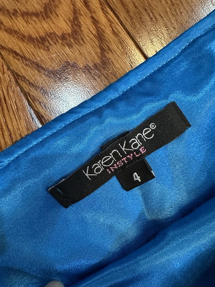 Falda lápiz midi Karen Kane con estilo de piel sintética estampado de leopardo para mujer talla 4 LNC Foto 4 de 4