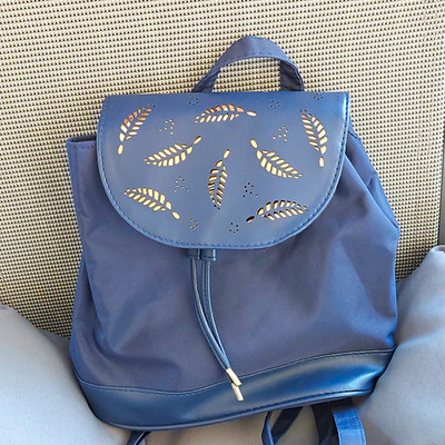 Marks and Spencer Damen Rucksack klein blau Cut-Out Blätter Zugband