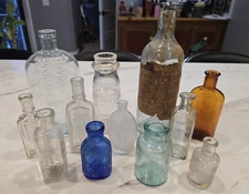 Lot of 12 Antique Embossed Glass Medicine & Misc. Bottles VTG