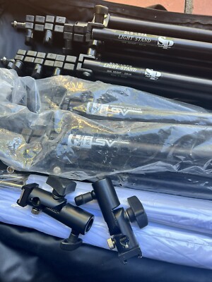 STUDIO LIGHTING LOT 2-LS8A, 2-SV RAVEN RS8, 4-UMBRELLAS, 2-ADJUSTABLE HEADS, BAG