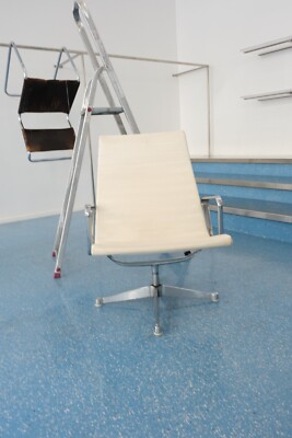 Aluminum armchairs Eames Charles