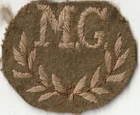 WW1 Guards Machine Gun Reg.?  Cloth "MG" Arm Badge Ex Tunic. Named Provenance