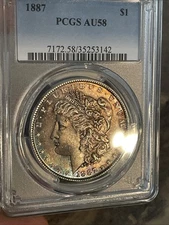 1887 Morgan Dollar PCGS AU58 Toned