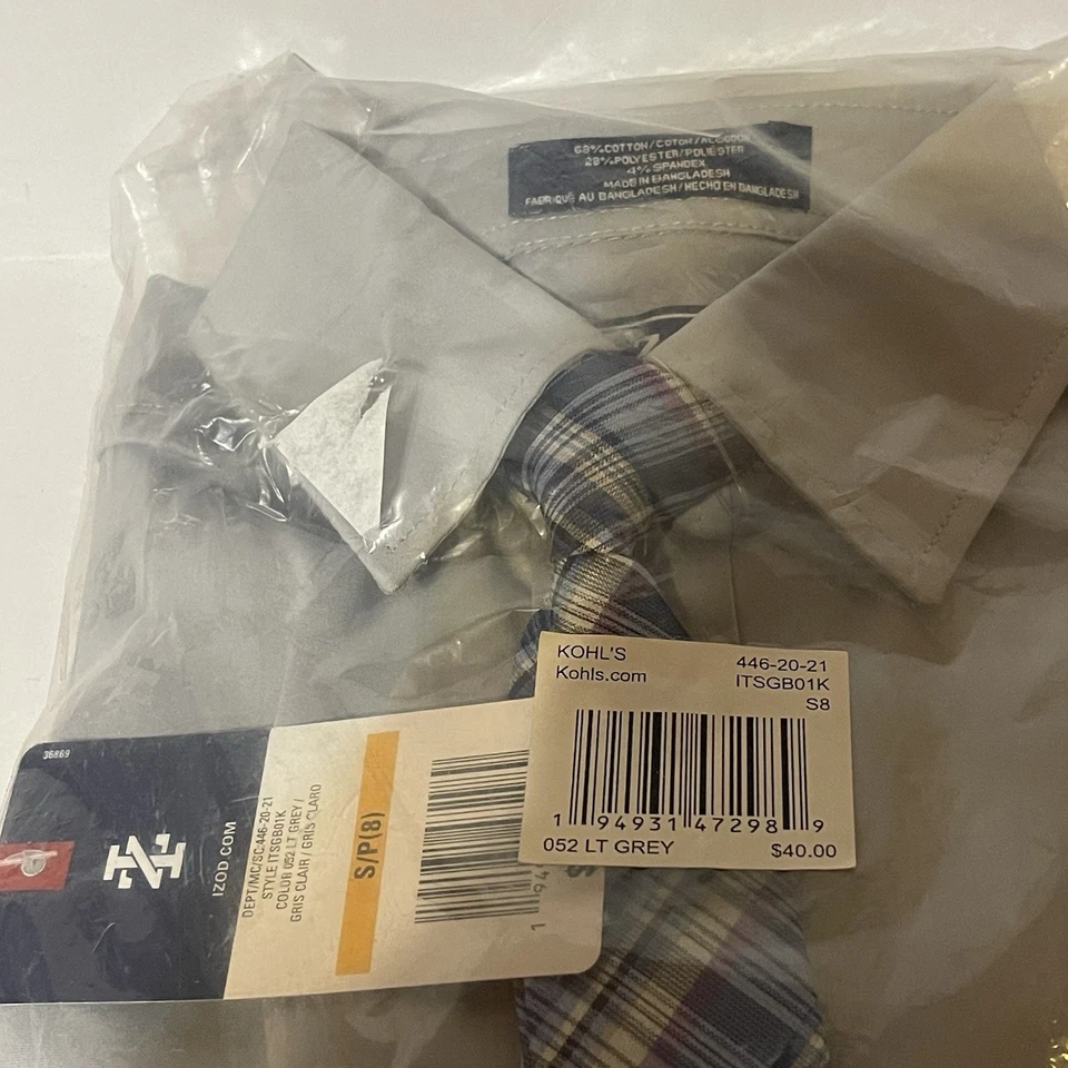 Camisa uniforme de vestir azul manga larga Izod para niño talla pequeña (8) con corbata con clip Foto 2 de 4