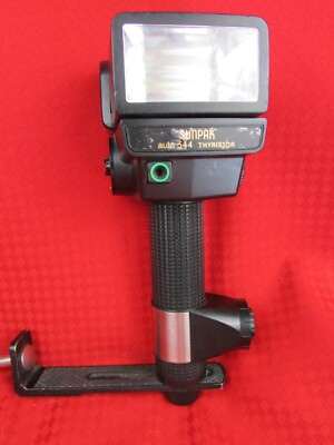 Sunpak Auto 544 Thyristor w/Camera Mount & Defuser Bracket