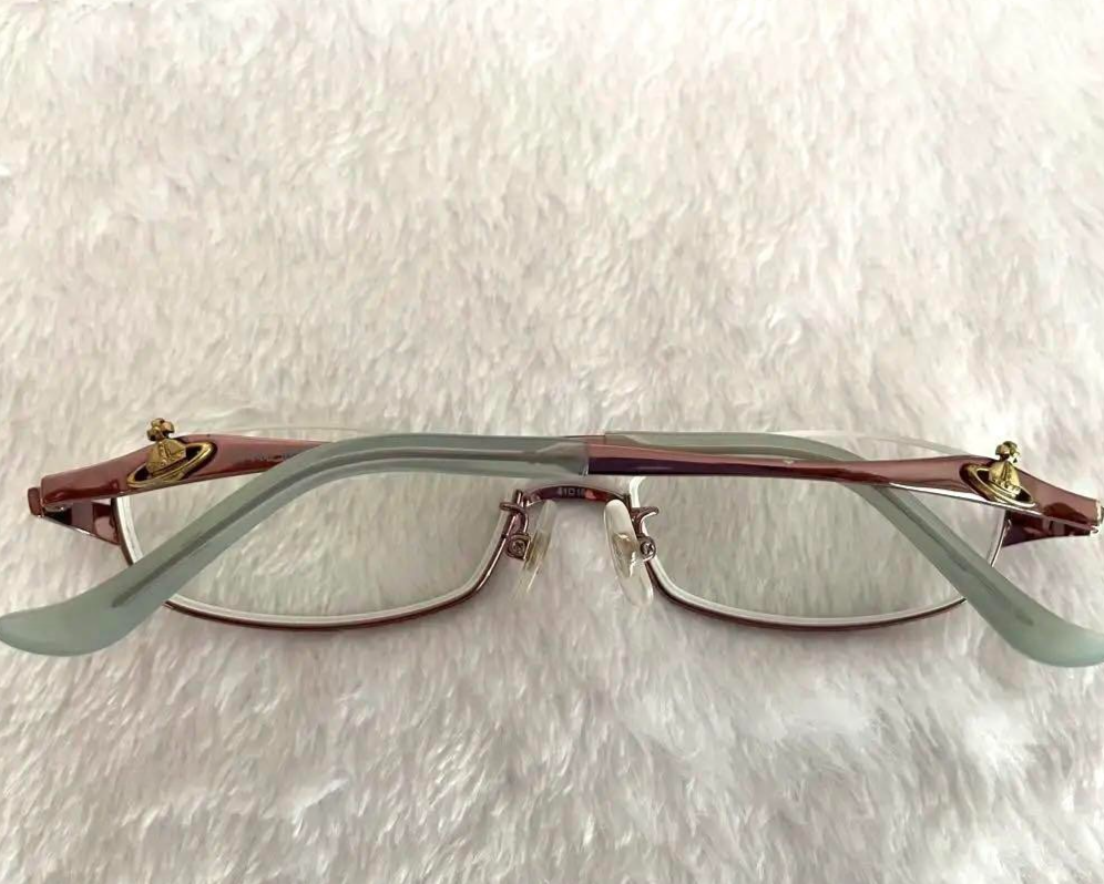 Vivienne Westwood rimless gold glasses lavender red purple From