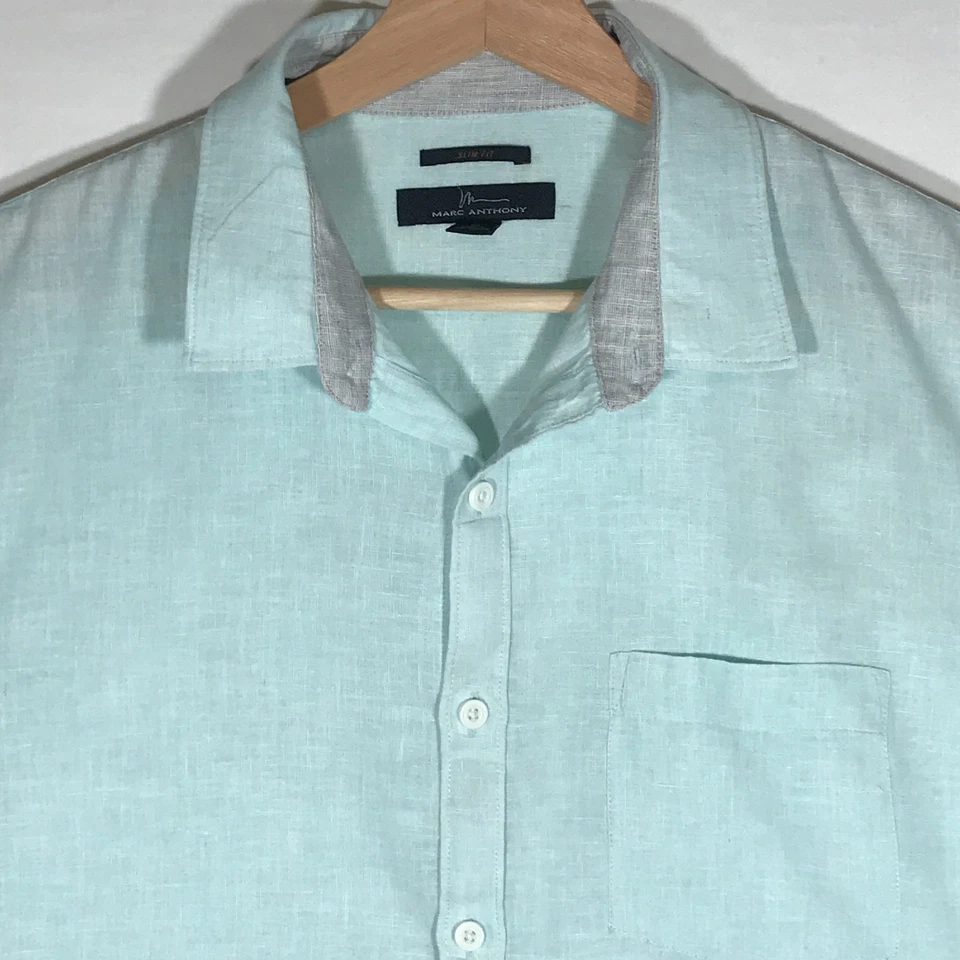 Camisa de manga corta con botones Marc Anthony para hombre calce ajustado mediana mezcla de lino aguamarina Foto 2 de 4