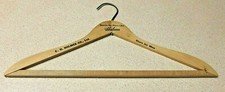 VINTAGE VERY OLD D.H. HOLMES WOODEN HANGER NEW ORLEANS LA.