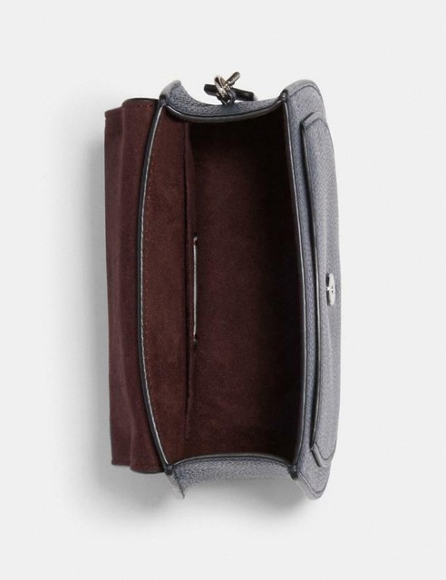 remi saddle bag with whipstitch daisy applique