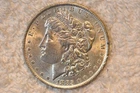 1885 -O. BU/UNC MORGAN DOLLAR.