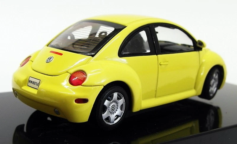 Coche modelo Autoart escala 1/43 59733 - VW nuevo escarabajo - amarillo Foto 2 de 4